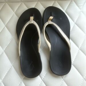 OluKai flip flops
